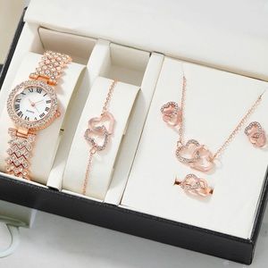 Womens, pink heart watch and jewelry set.